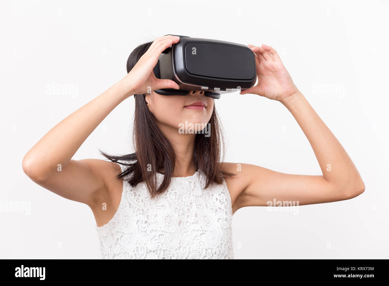 Young Woman Wearing Virtual Reality Headset Stock Photo - Alamy
