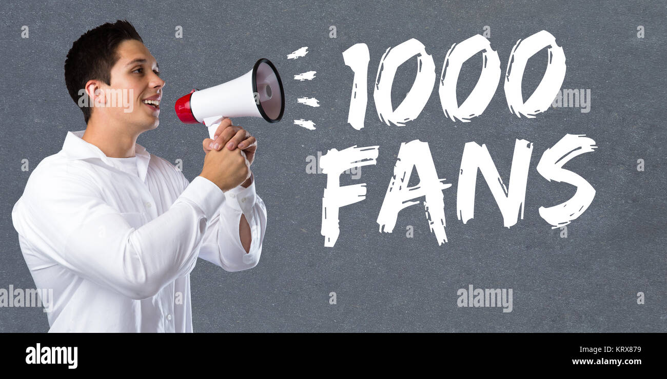 1,000 fans likes thousand social media networks concept megaphone young man Stock Photo