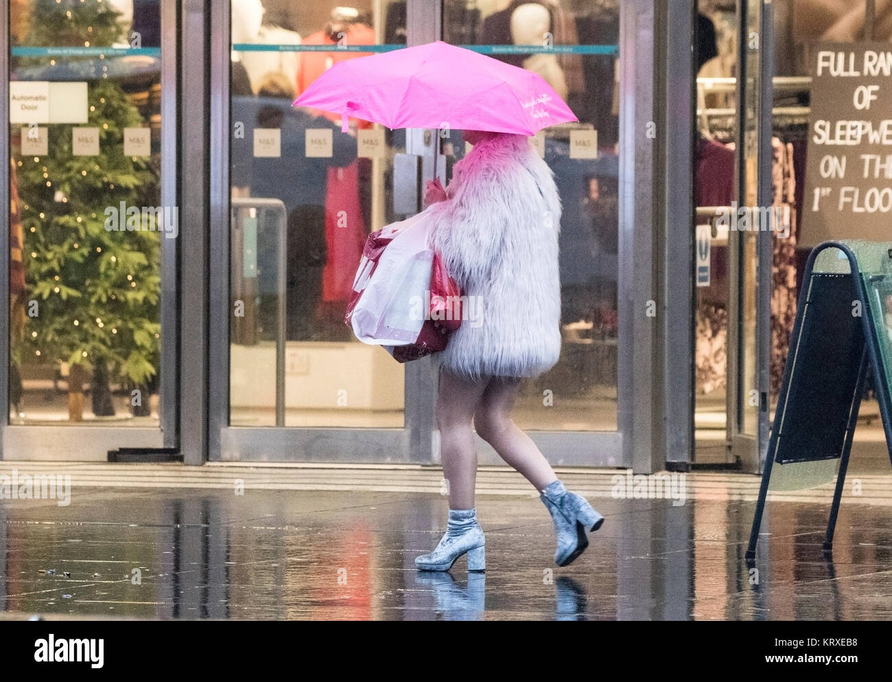 Umbrellas couple heavy rain downpour walking hi-res stock photography ...