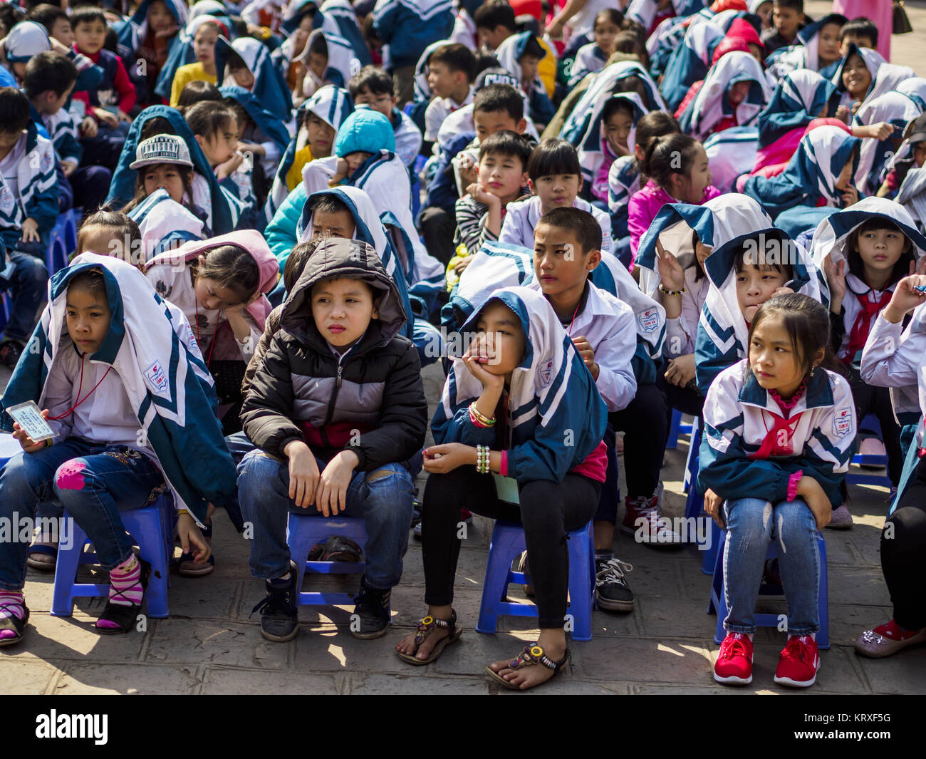 Hanoi, Ha Noi, Vietnam. 21st Dec, 2017. Children at an assembly in the Temple of Literature, a Confucian temple dedicated to learning and the humanities. It was also Vietnam's first national university. The temple was built in 1070 at the time of Emperor LÃ½ ThÃ¡nh TÃ´ng. It is one of several temples in Vietnam which is dedicated to Confucius, sages and scholars. Credit: Jack Kurtz/ZUMA Wire/Alamy Live News Stock Photo