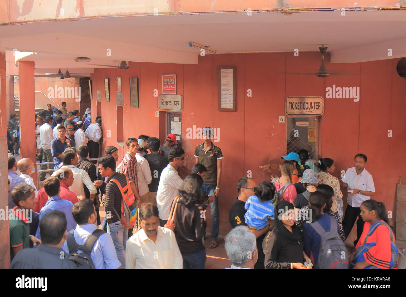 People buy admission for Red fort in New Delhi India. Red fort was main residence of the emperors of the Mughal dynasty for 200 years until 1858 Stock Photo