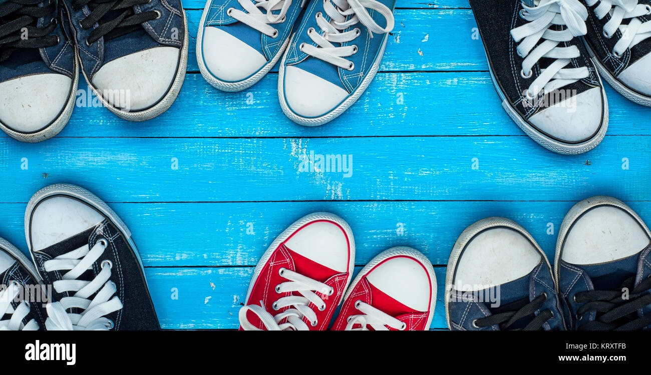wearing sneakers on a blue wooden surface, top view Stock Photo - Alamy