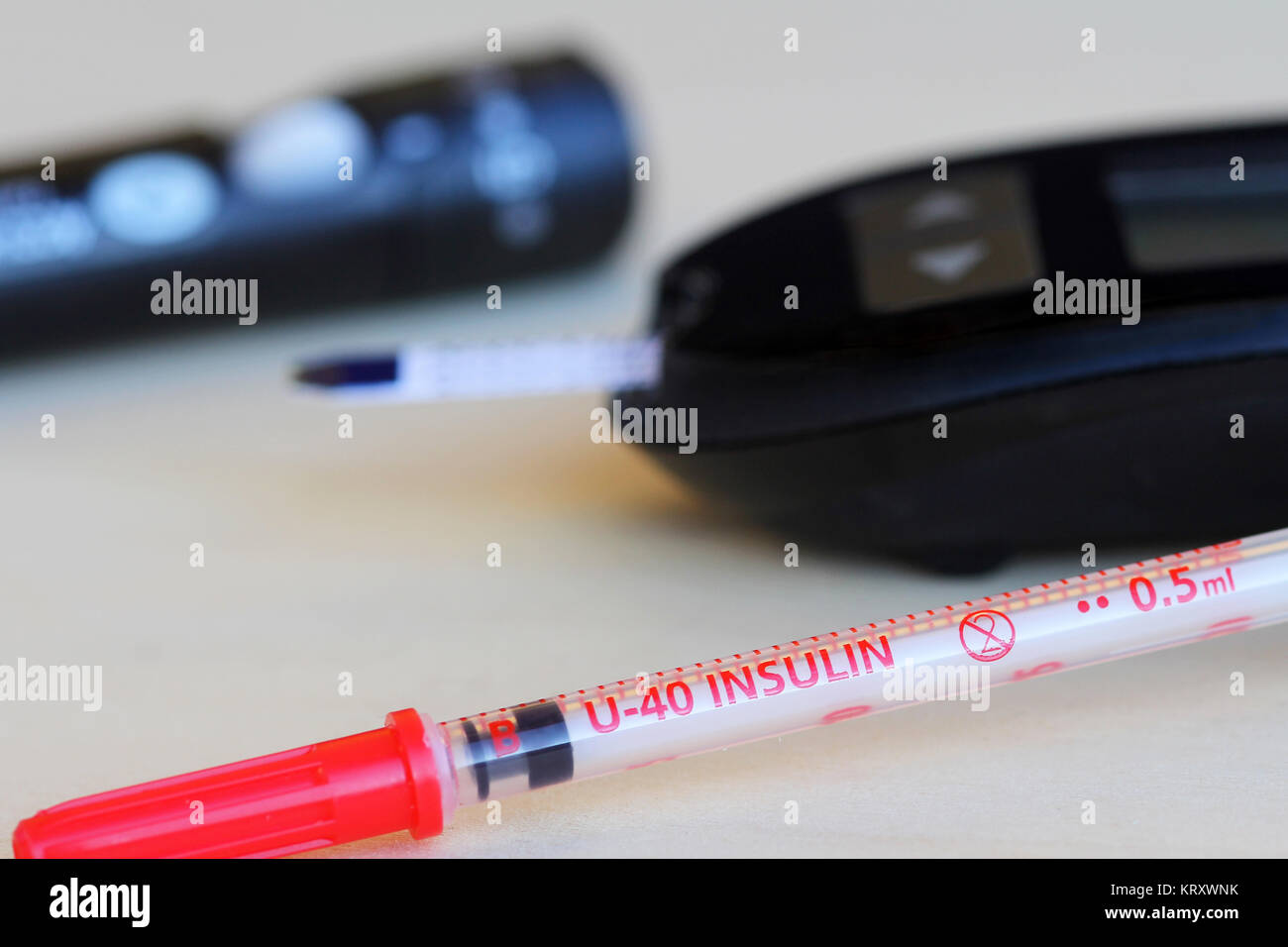 diabetes insulin syringe and blood glucose meter Stock Photo Alamy