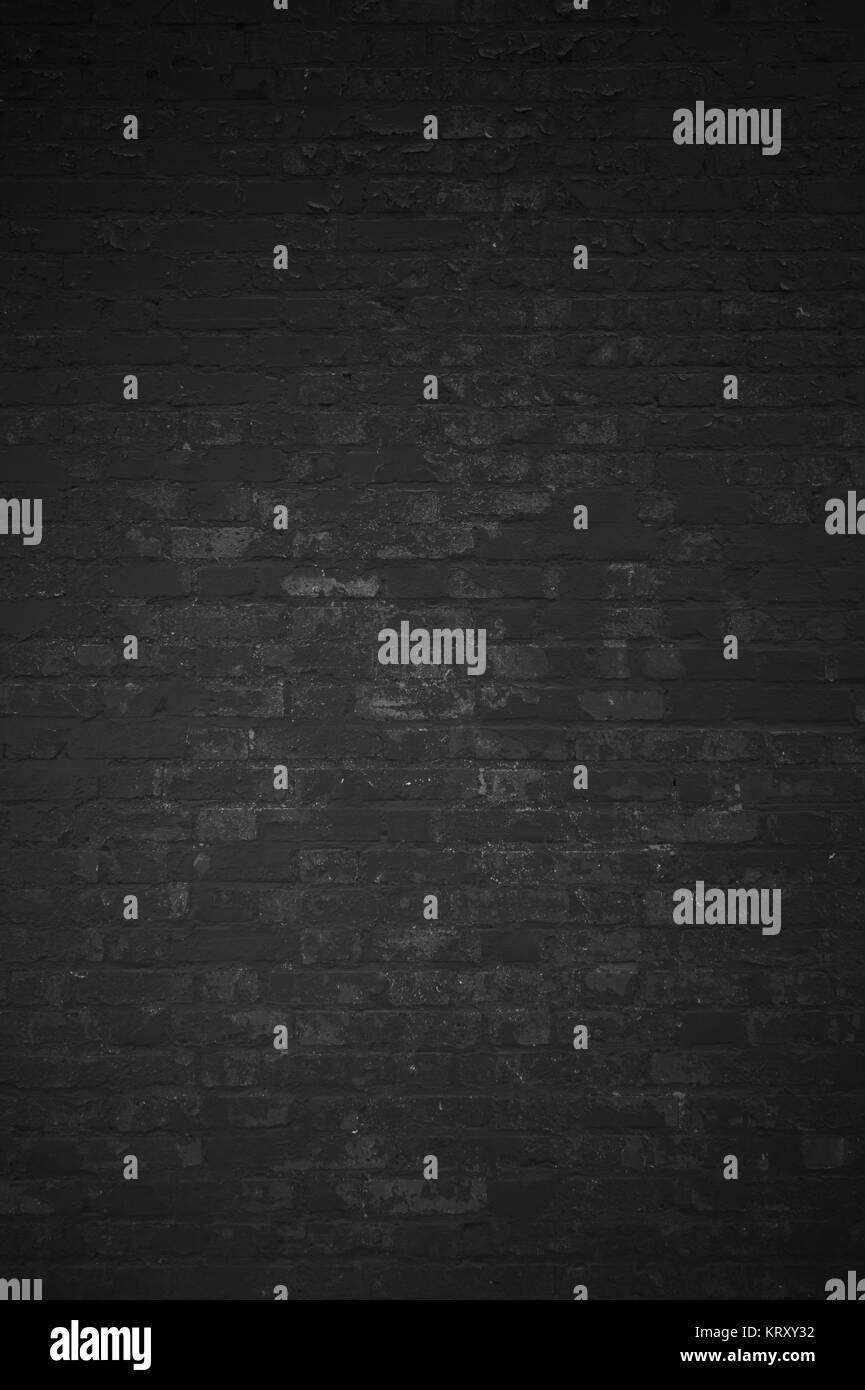 old dark brick wall as a rustic urban background Stock Photo - Alamy