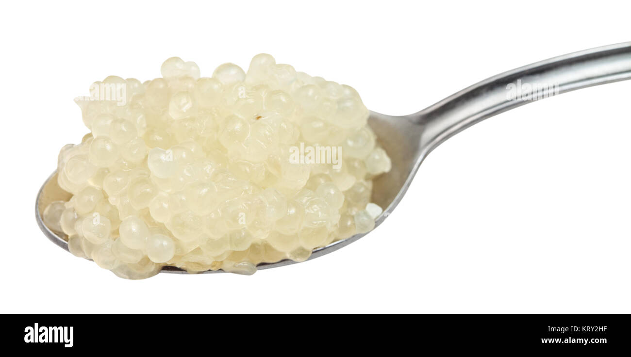 caviar of halibut fish in steel spoon close up Stock Photo