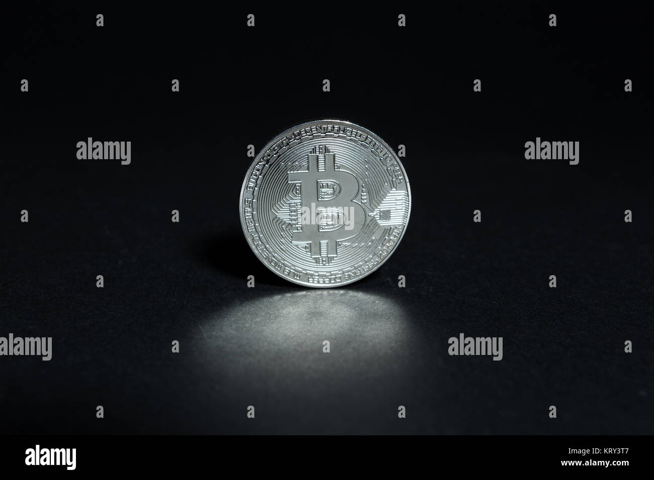 Single virtual cryptocurrency money Bitcoin golden coin on United Kingdom  Pound sterling banknotes with face of Adam Smith Stock Photo - Alamy