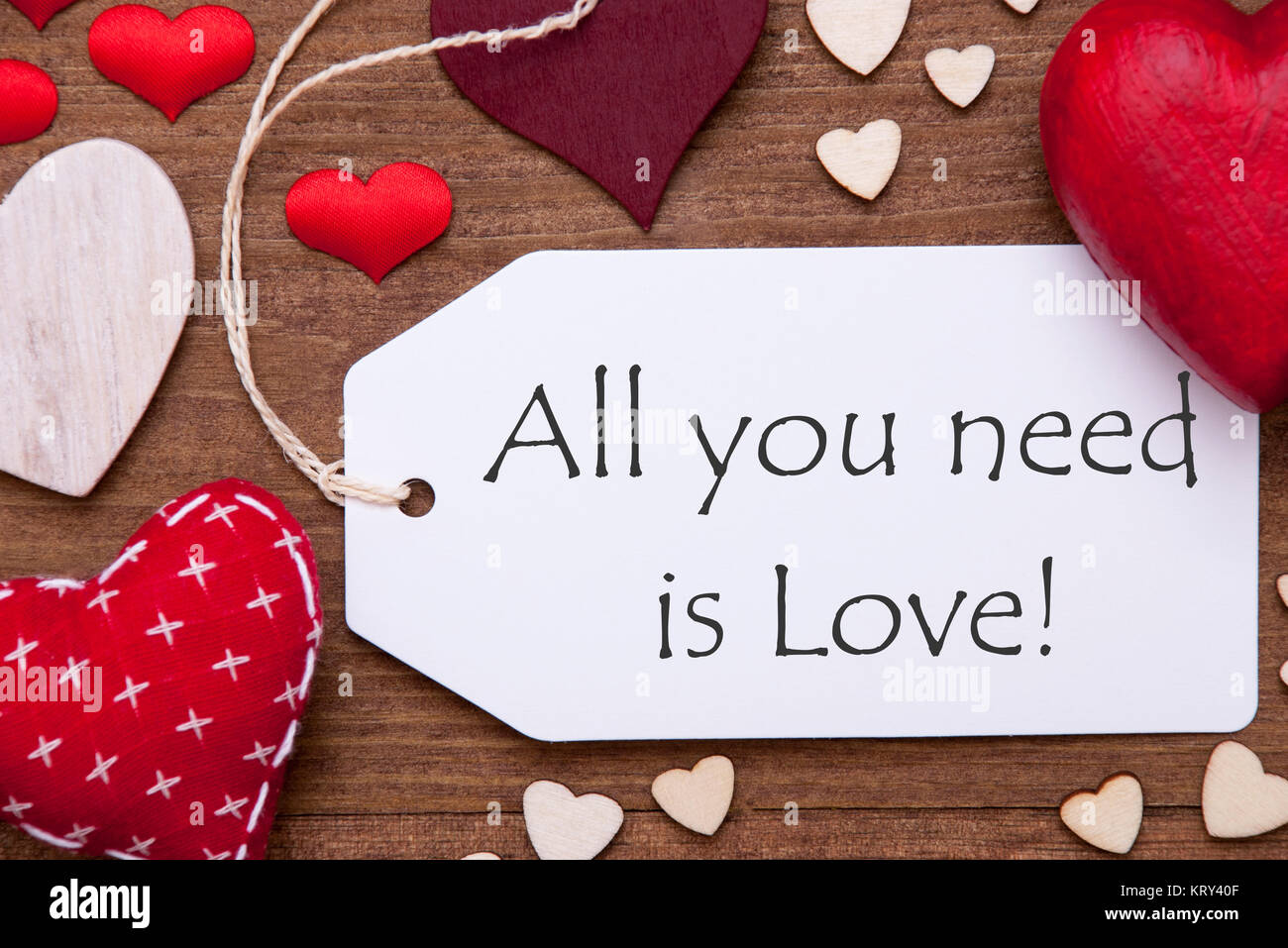 Label With English Quote All You Need Is Love Red Textile Hearts On Wooden Background Flat Lay With Retro Or Vintage Style Stock Photo Alamy