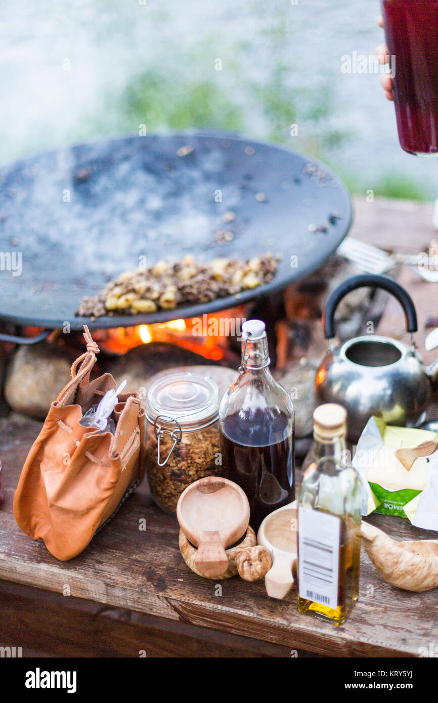 Food and condiments outside at a campfire Stock Photo - Alamy