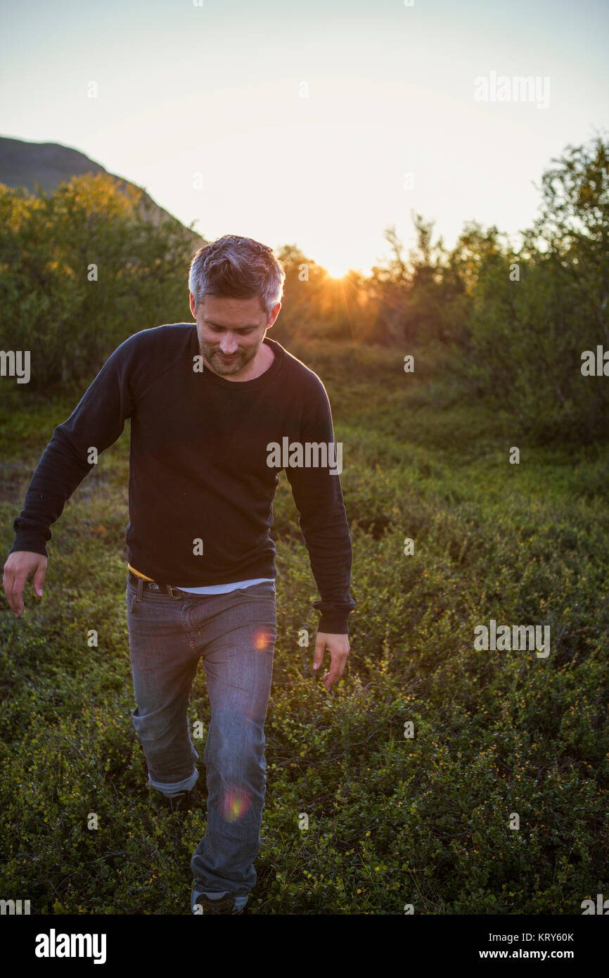 A man outdoors in the Swedish countryside Stock Photo