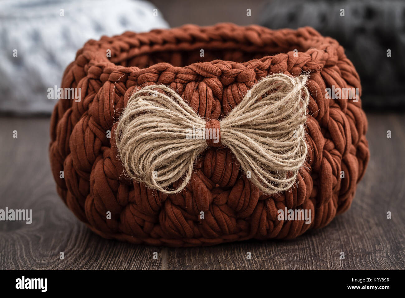 Decorative Knitted Baskets with Ribbons Stock Photo - Alamy