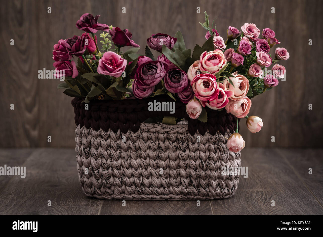 Decorative Knitted Baskets with Ribbons Stock Photo - Alamy