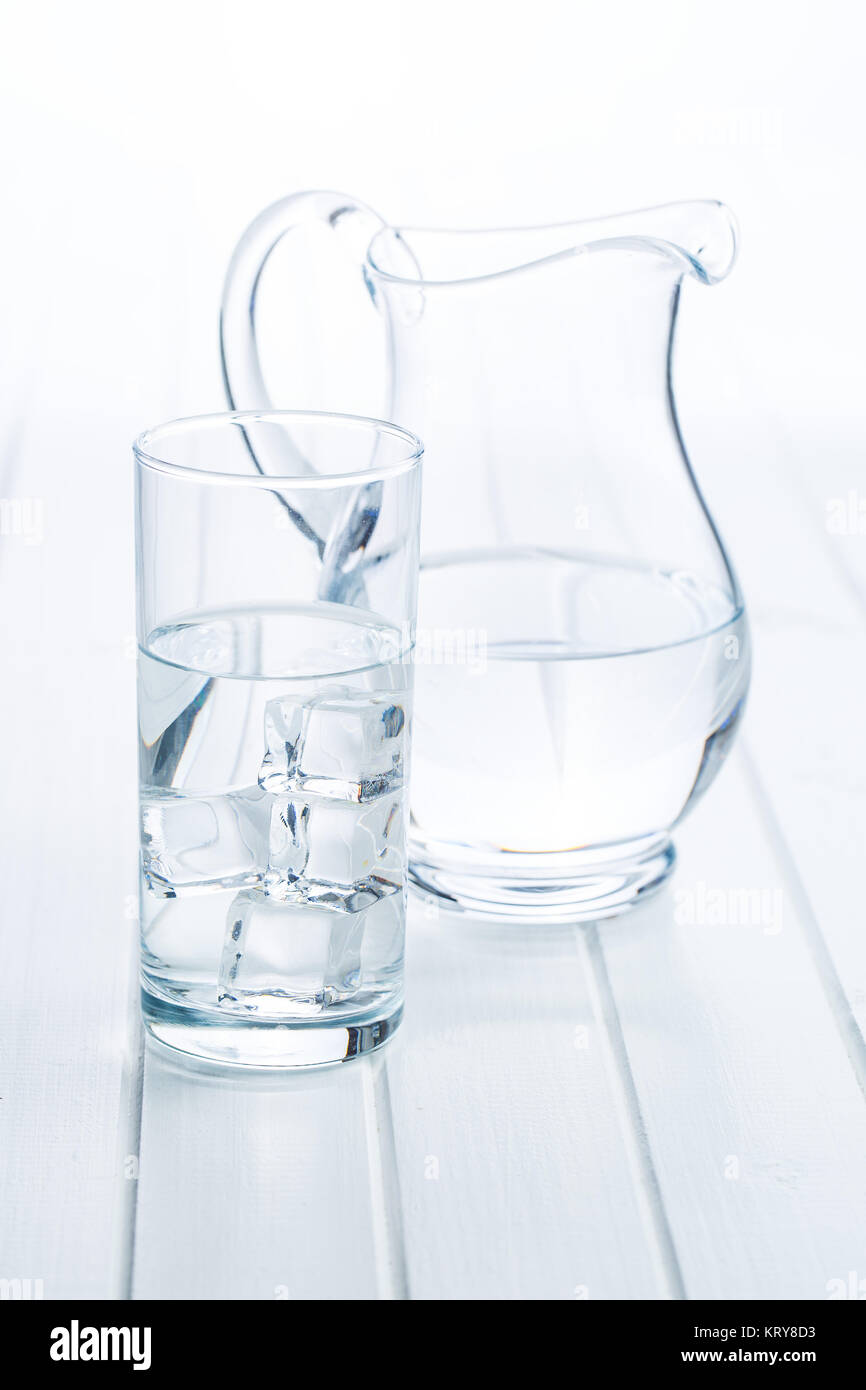 Glass of pure water with ice cubes Stock Photo - Alamy