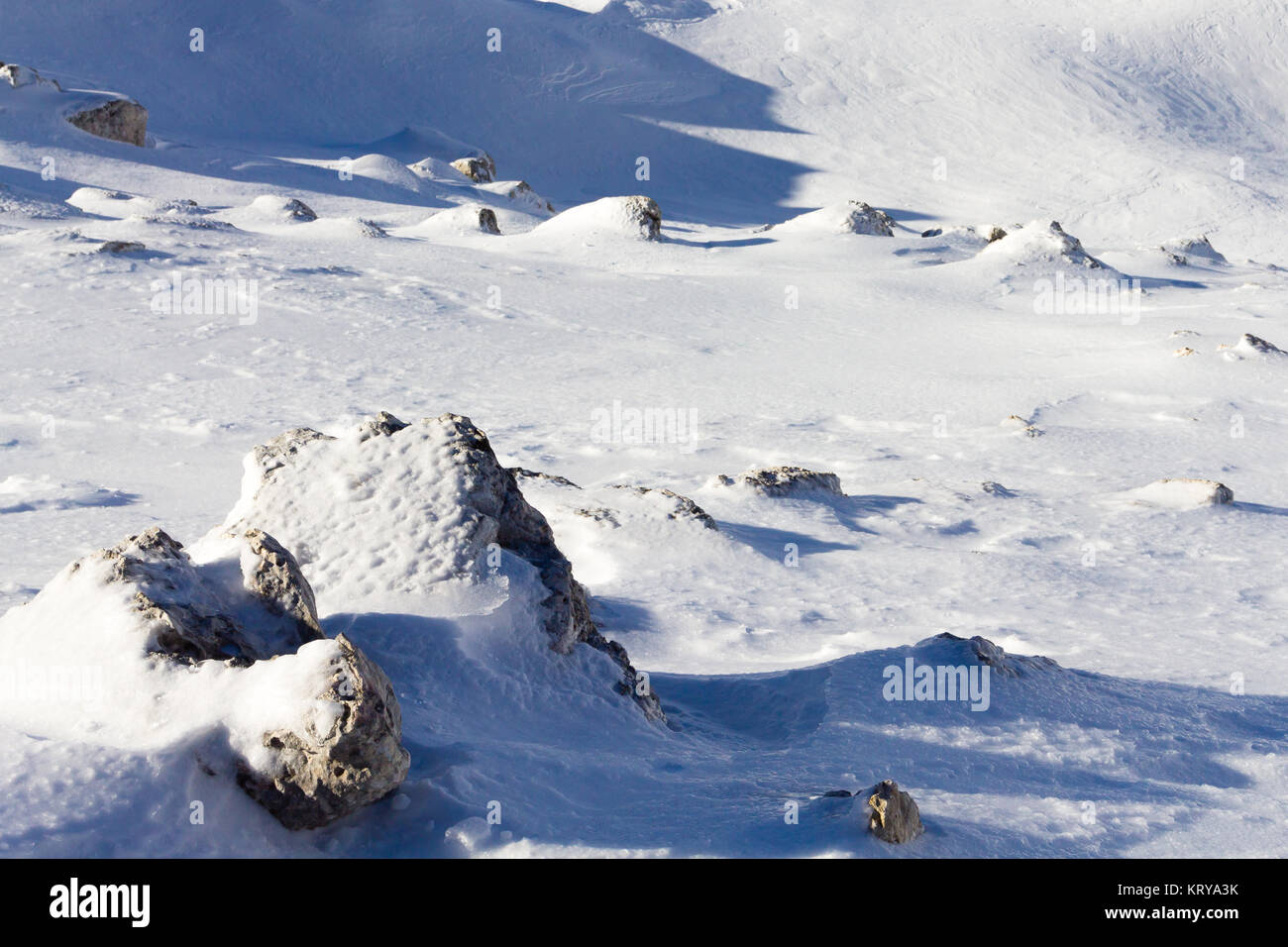 Rocks and snow Stock Photo - Alamy