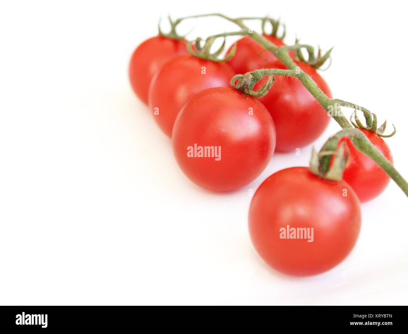 red tomatoes isolated on the white Stock Photo - Alamy