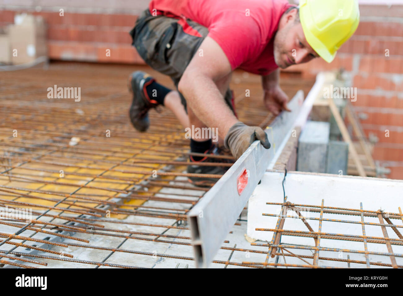 Bauarbeiter am Bau - building worker at building lot Stock Photo