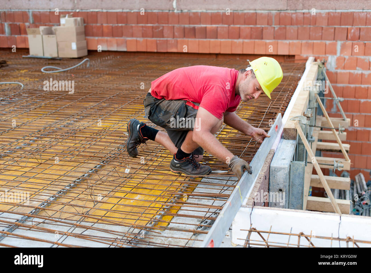 Bauarbeiter am Bau - building worker at building lot Stock Photo