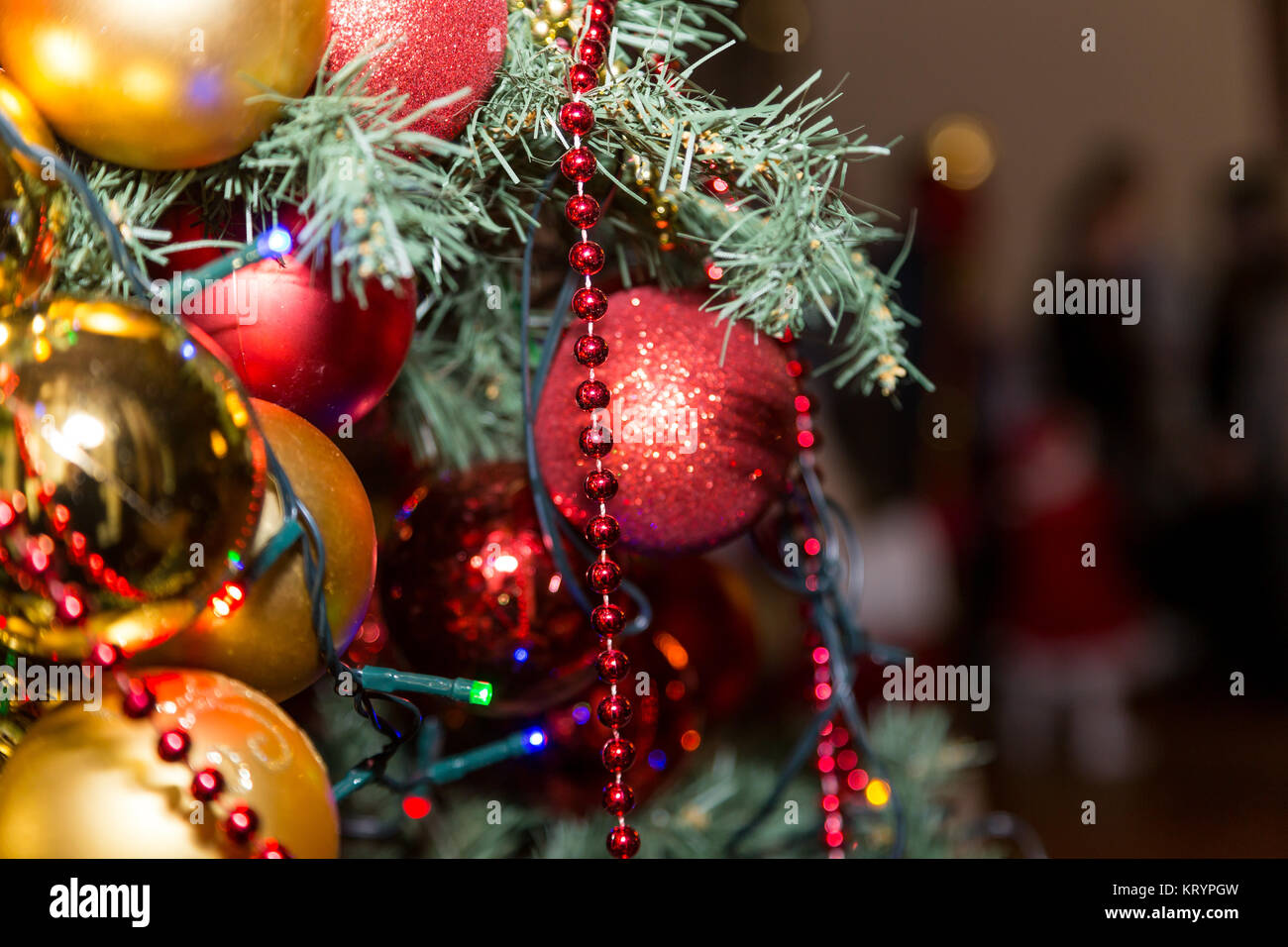closeup christmas tree with decorative balls and garland Stock Photo ...