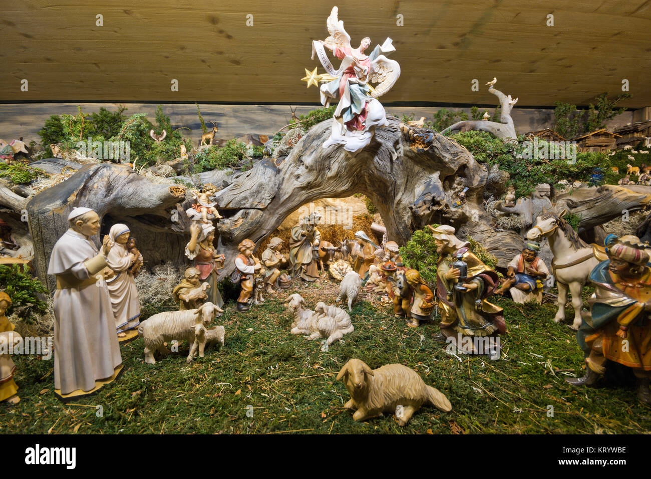 Wood carving, traditional old wooden figures of a christmas crib at an popular vienna christkindlmarkt. Stock Photo