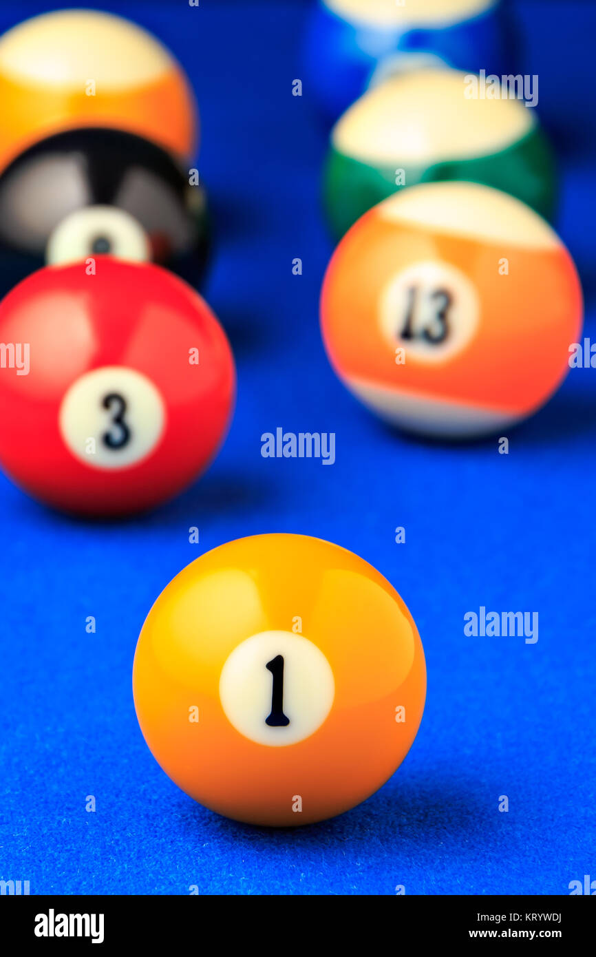 Billiard balls in a blue pool table Stock Photo Alamy