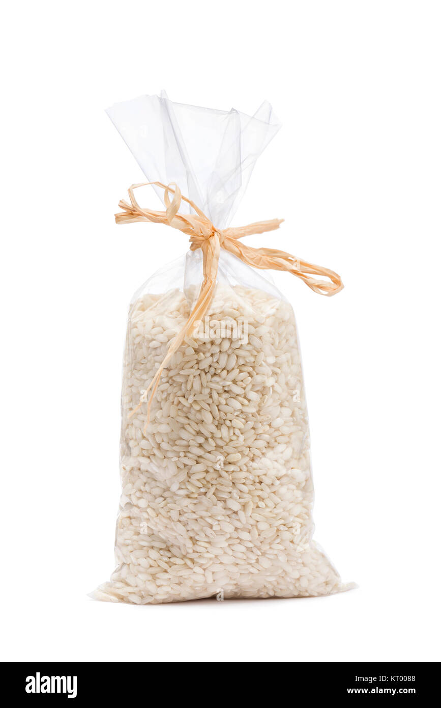 heap of white rice in transparent plastic bag, on white background ...