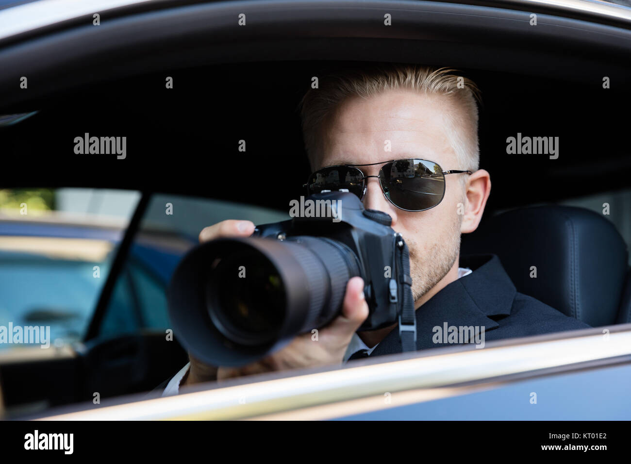 Man Photographing With SLR Camera Stock Photo - Alamy