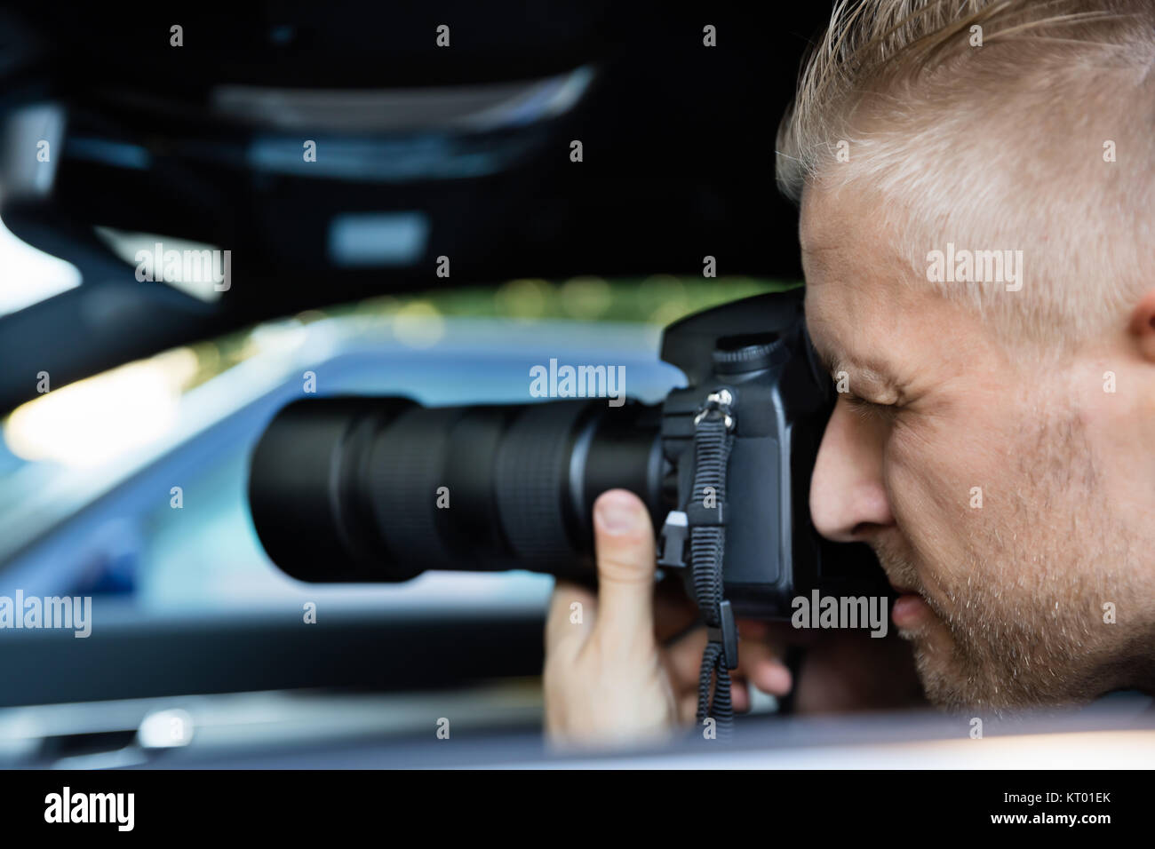 Man Photographing With SLR Camera Stock Photo - Alamy