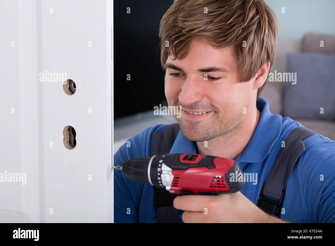 Carpenter Installing Door Lock Stock Photo Alamy