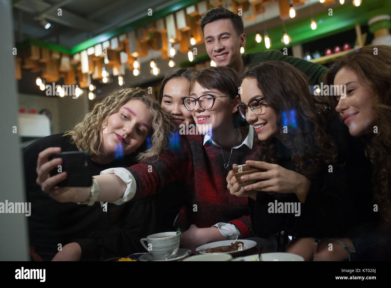 Group positive teenagers selfies hi-res stock photography and images