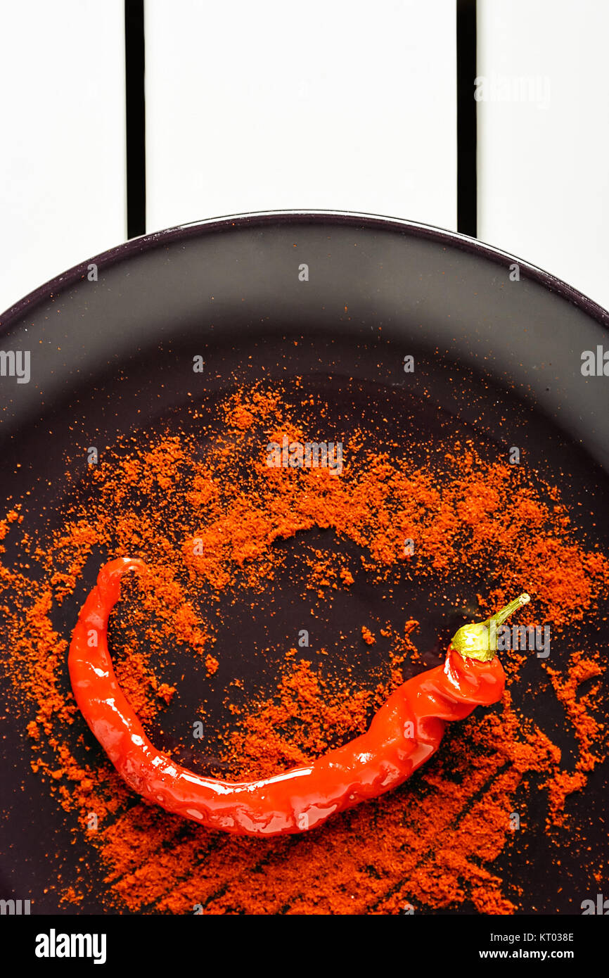 Red pepper with ground paprika Stock Photo Alamy