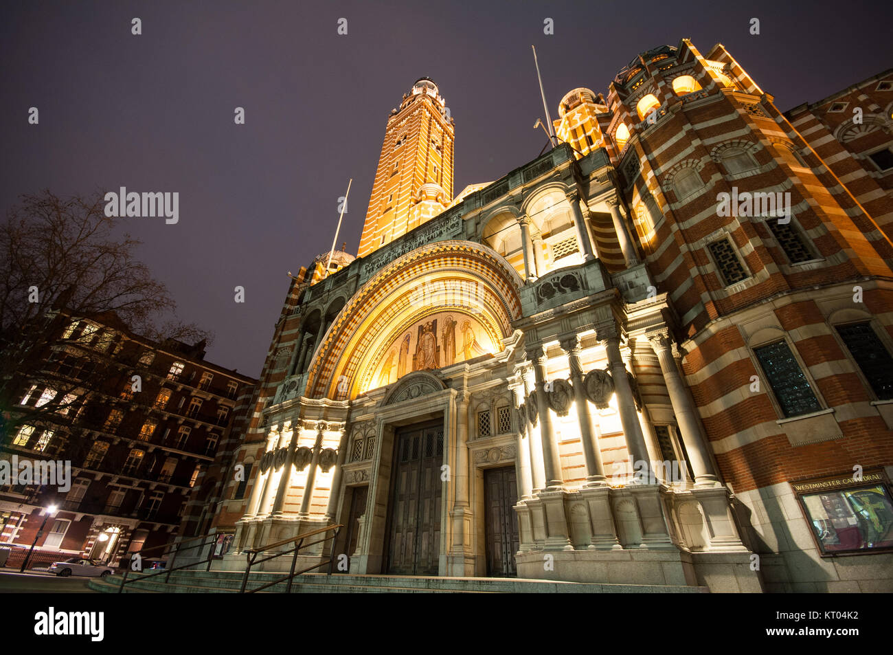 London, England, UK - December 1, 2009: The byzantine architecture of Westminster Roman Catholic Cathedral lit up at night. Stock Photo