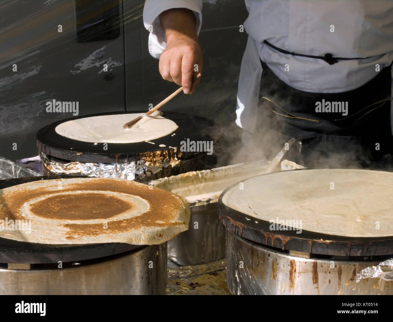 Cooking crêpes on french market, Cambridge Stock Photo