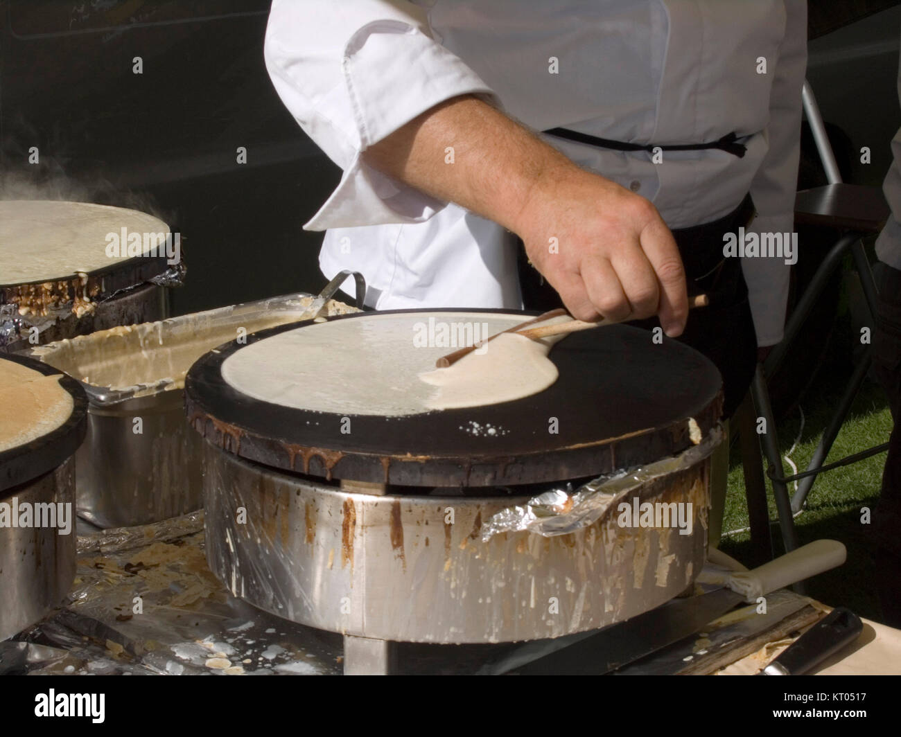 Cooking crêpes on french market, Cambridge Stock Photo