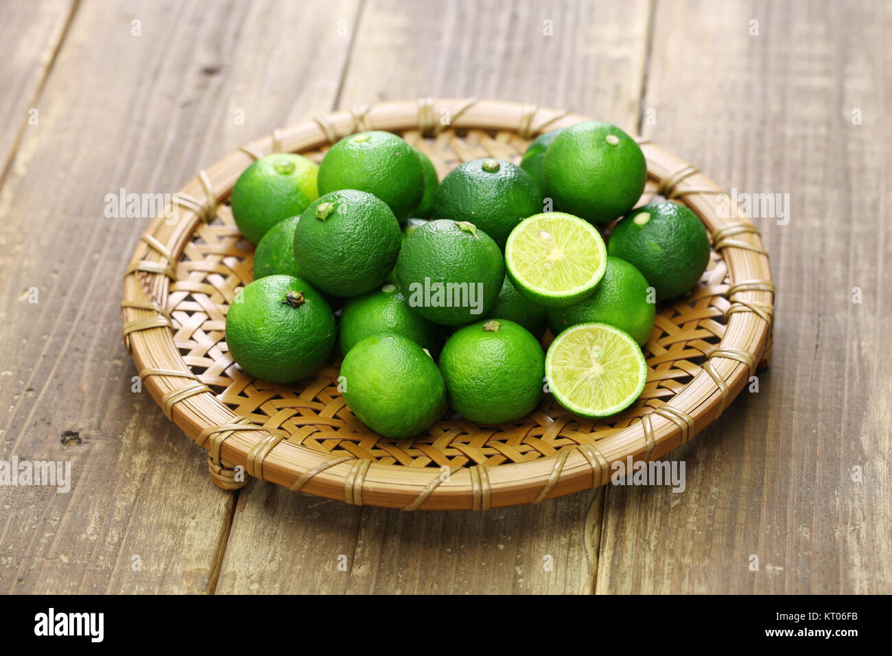 sudachi, japanese citrus fruit, is served as garnish with many traditional japanese dishes Stock Photo