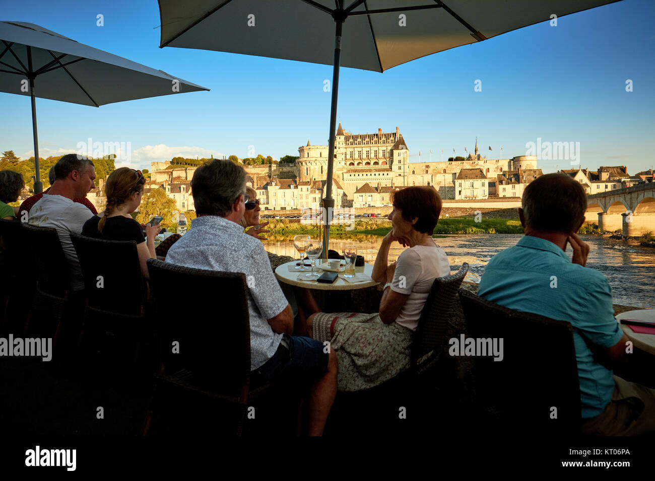 Eating and drinking outside at sunset in Amboise in the Loire Valley France Stock Photo