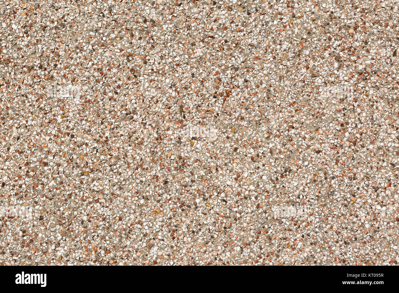 Close up image of a pebble-dashed wall Stock Photo