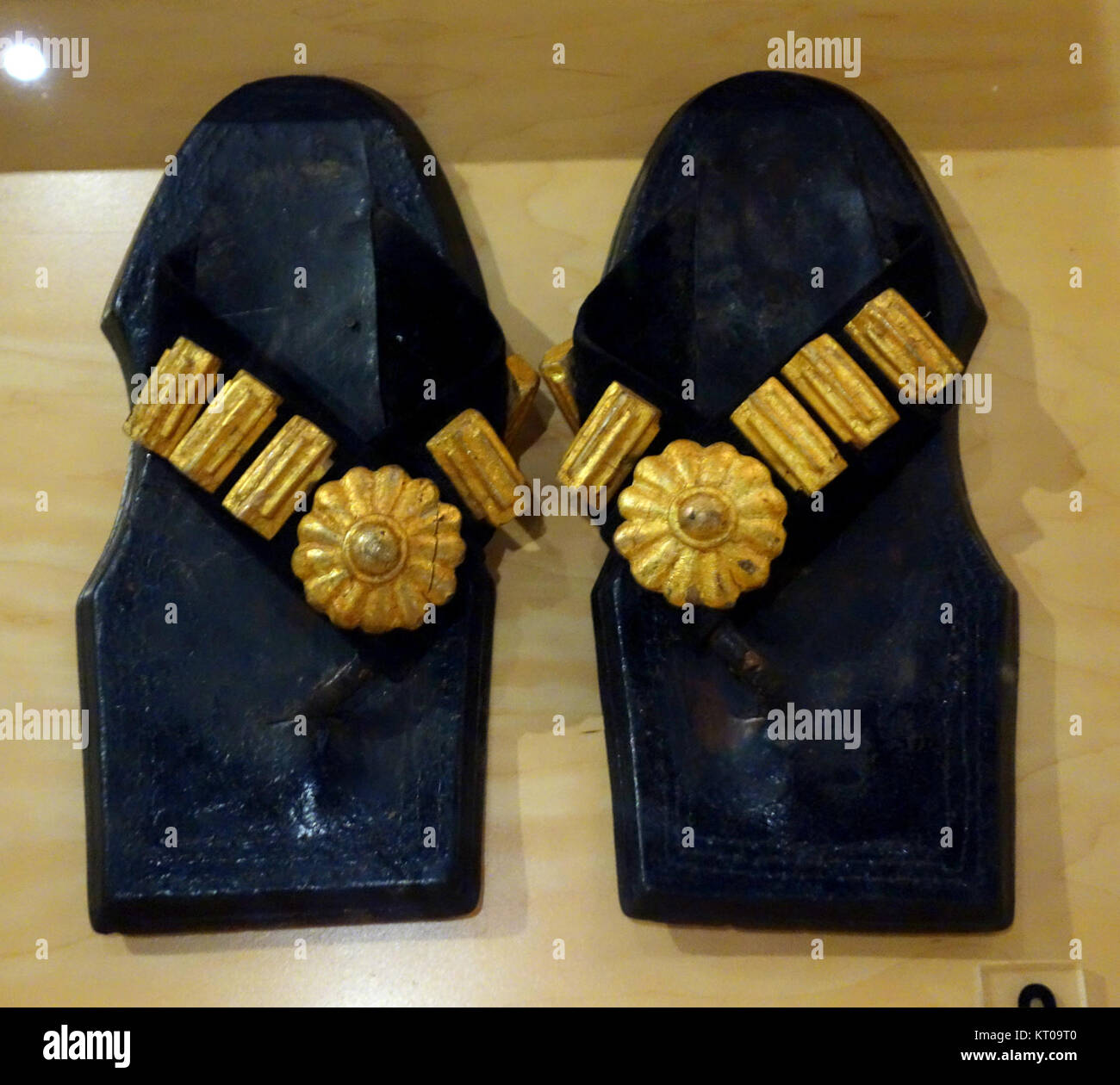 Traditional Ruler Shoes The Asante ruler's sandals, accompanied by gold ornaments, are a ...