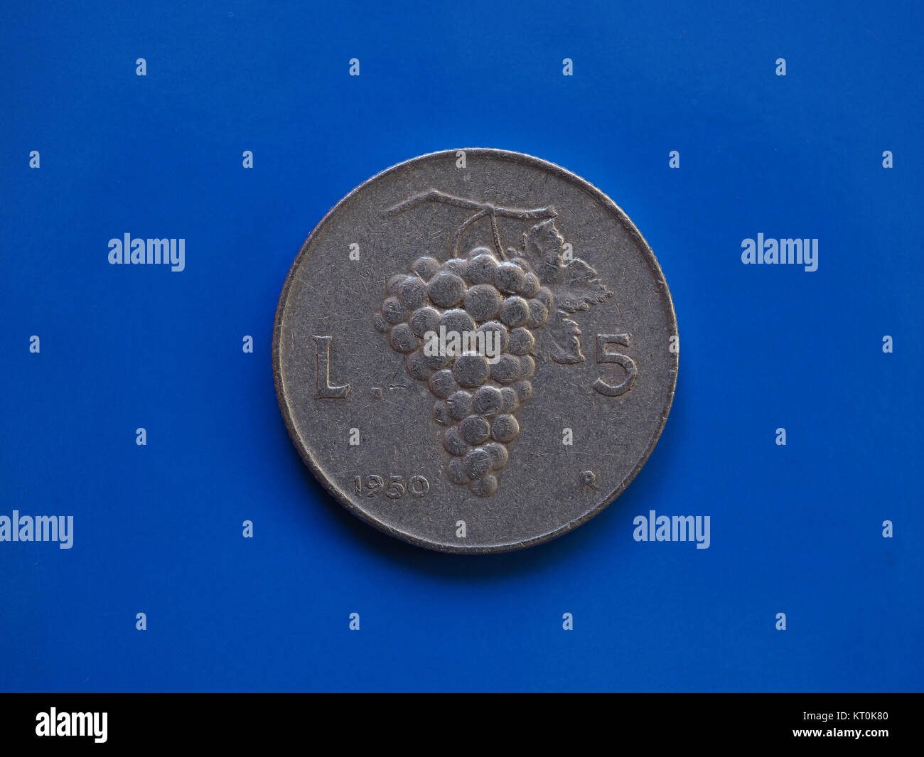 5 liras coin, Italy over blue Stock Photo
