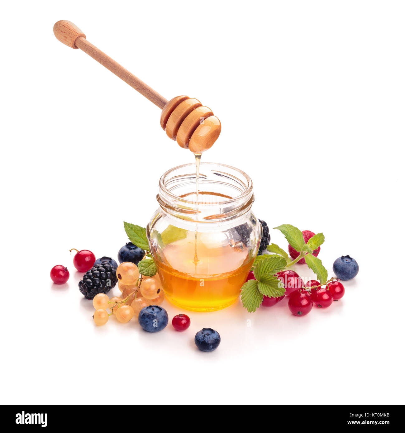 Honey and berries Stock Photo Alamy