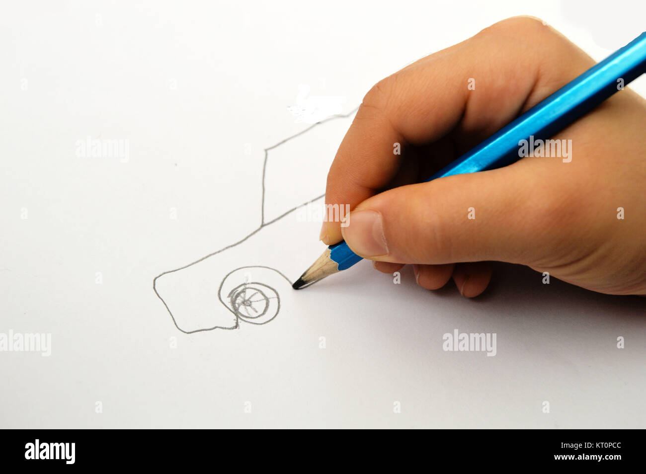 To be a child and to draw a car picture Stock Photo