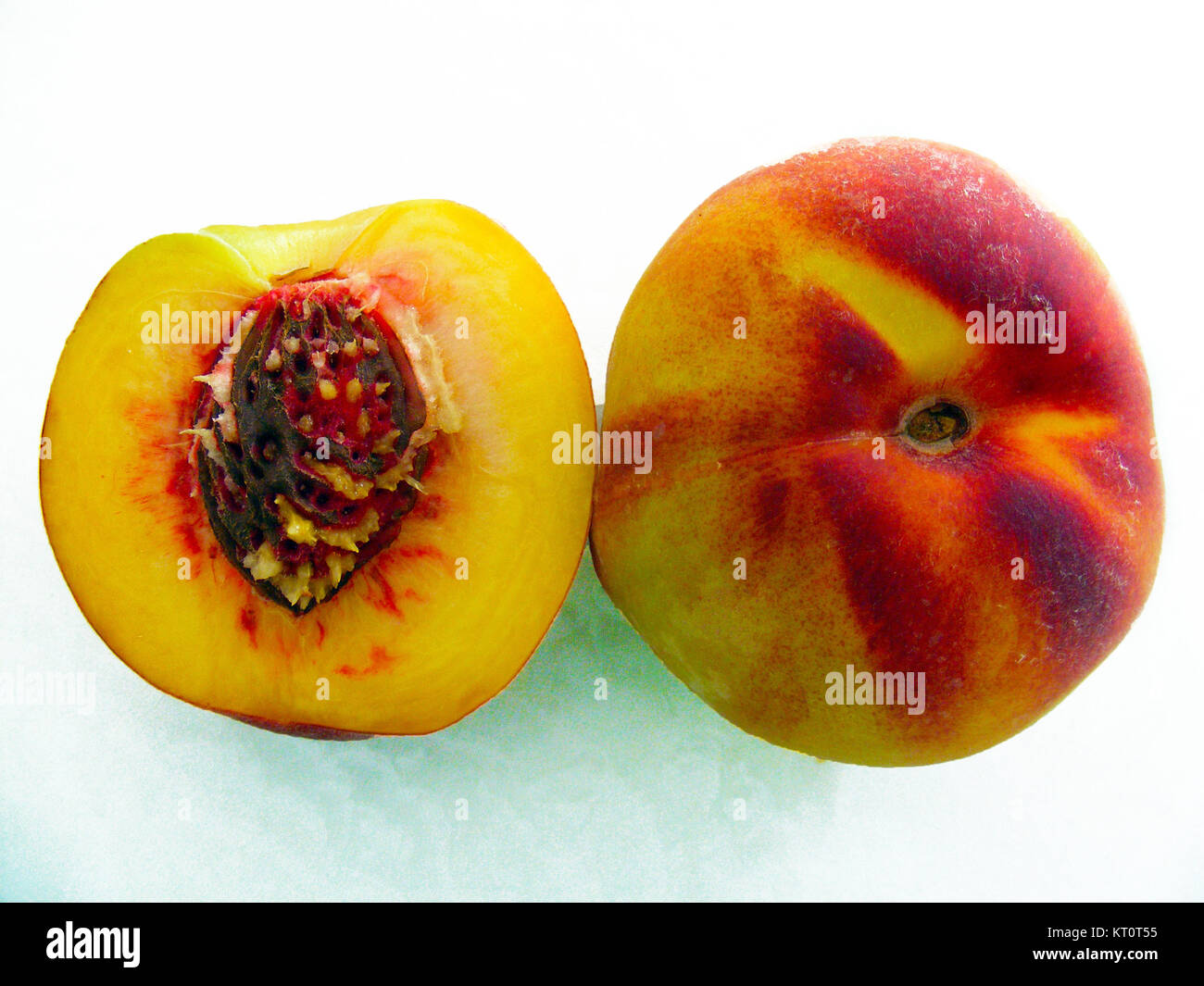 Peach and peach seeds Stock Photo Alamy