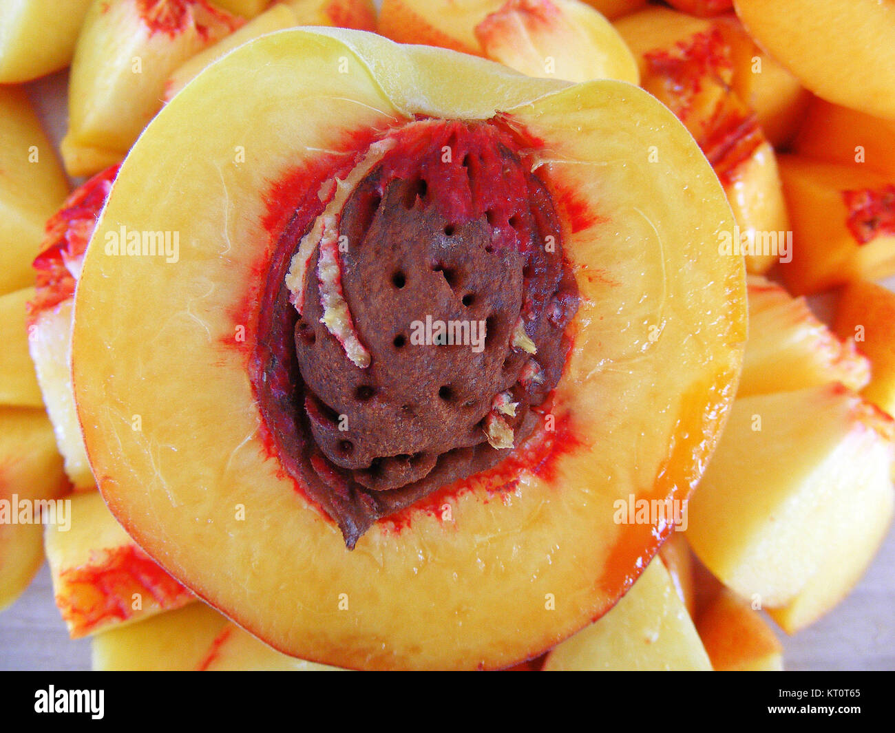 Peach and peach seeds Stock Photo Alamy