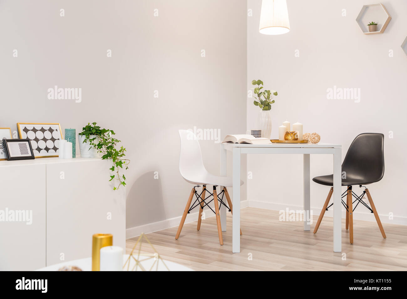 Dining area with two chairs and table in nordic style Stock Photo