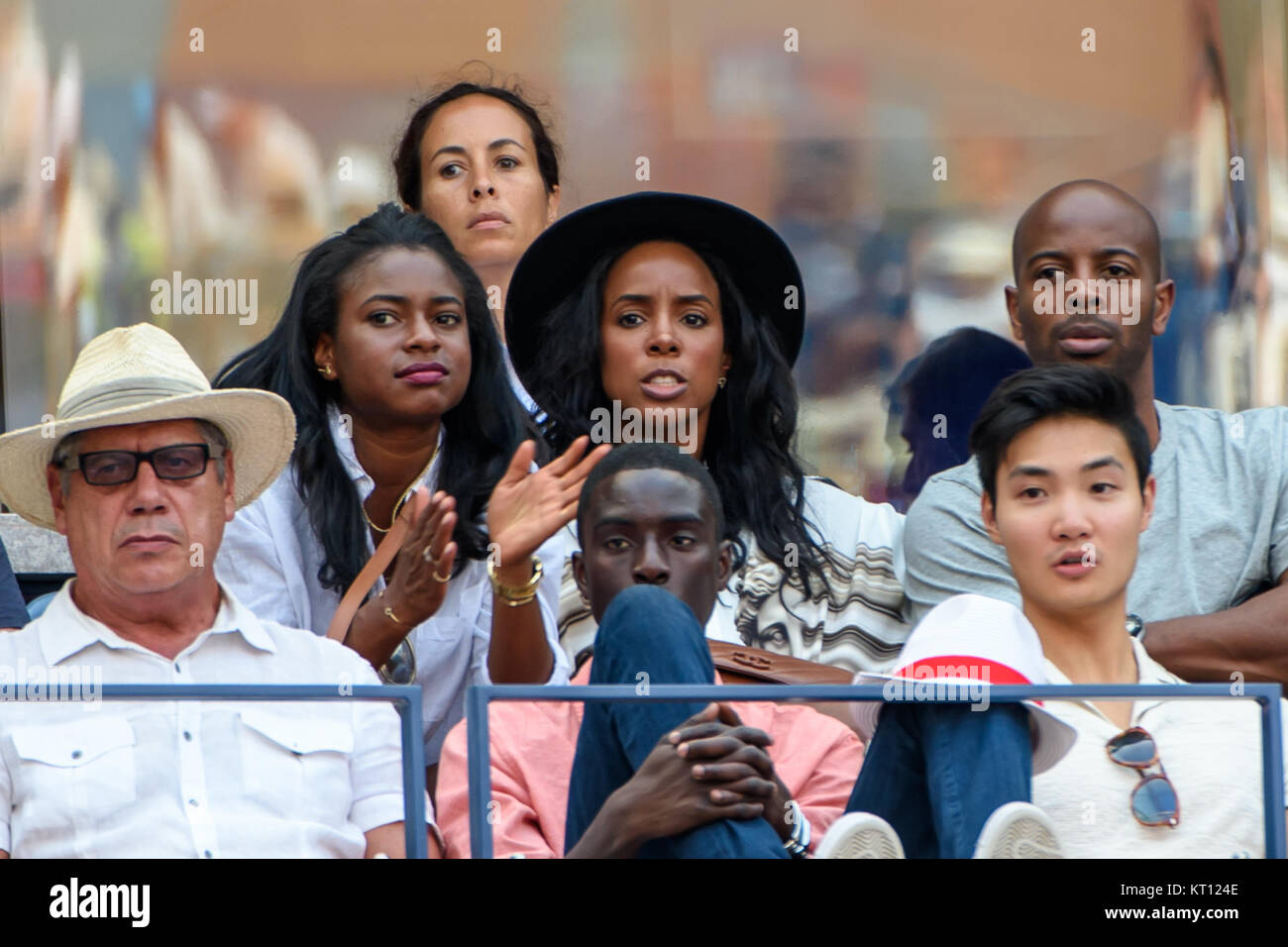 NEW YORK, NY - SEPTEMBER 02: Singer Kelly Rowland and Tim Witherspoon seen on Day Three of the 2015 US Open at the USTA Billie Jean King National Tennis Center on September 2, 2015 in the Flushing neighborhood of the Queens borough of New York City.  People:  Kelly Rowland, Tim Witherspoon Stock Photo