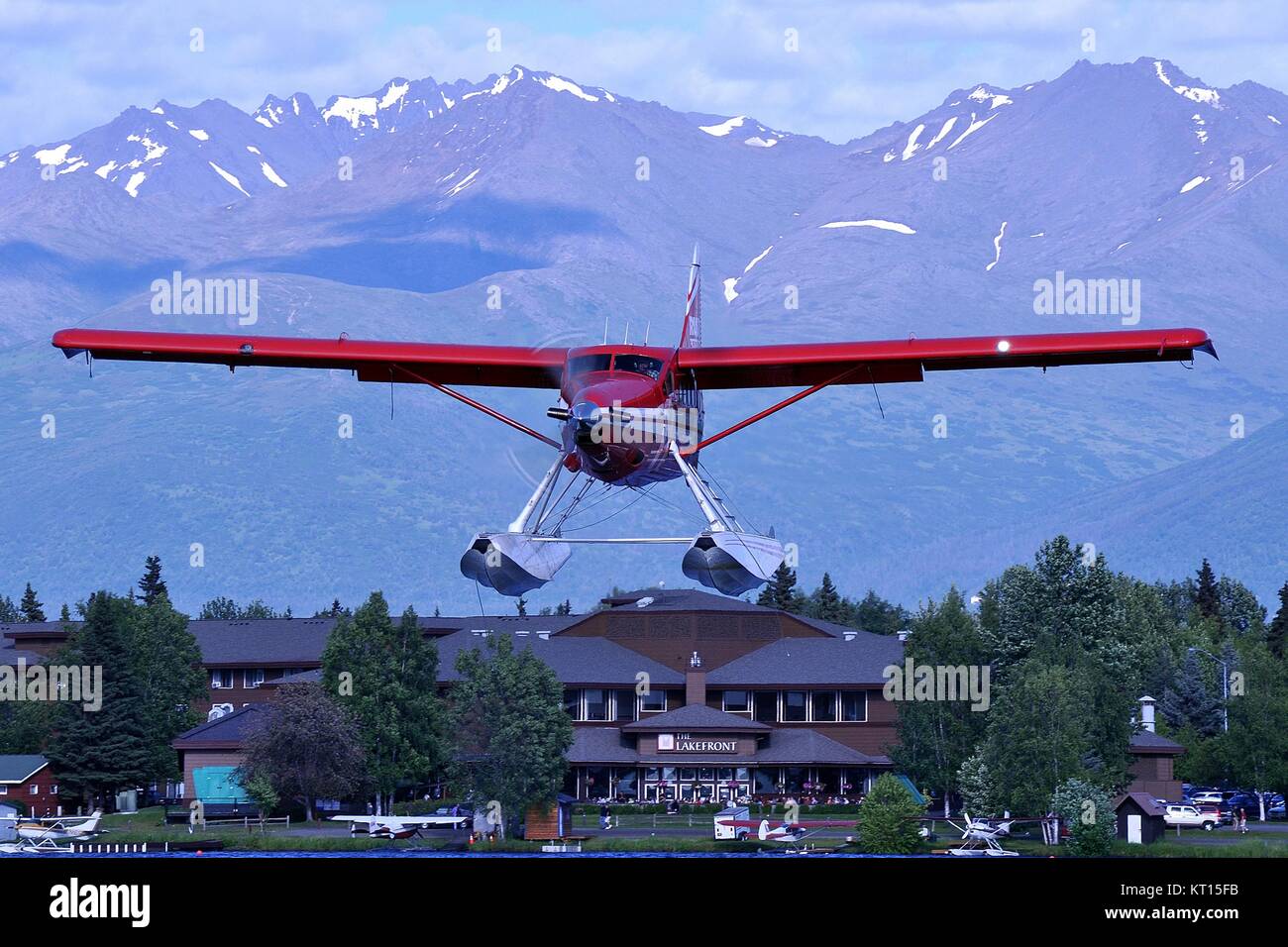 RUST'S FLYING SERVICE DHC-3T TURBO OTTER ABOUT TO LAND ON LAKE HOOD, ALASKA. Stock Photo