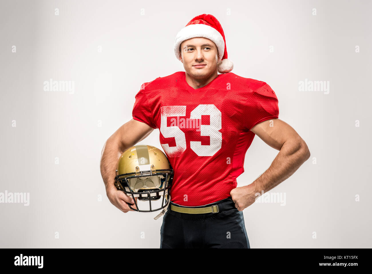 Football player in santa hat Stock Photo