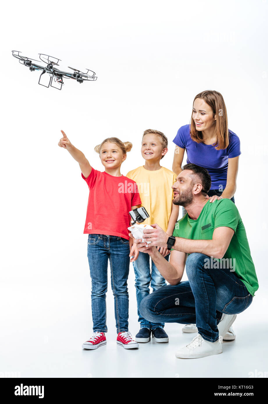 Kids using flying hexacopter drone Stock Photo - Alamy
