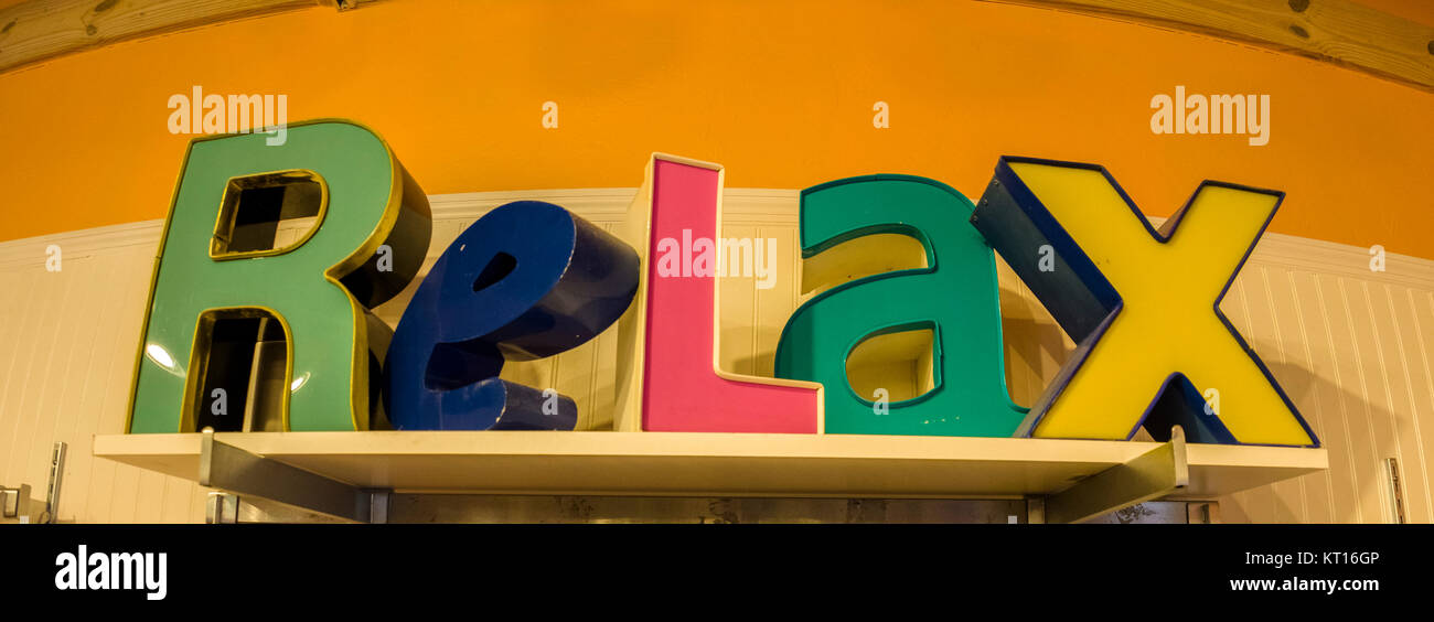 Relax sign in different colored letters Stock Photo