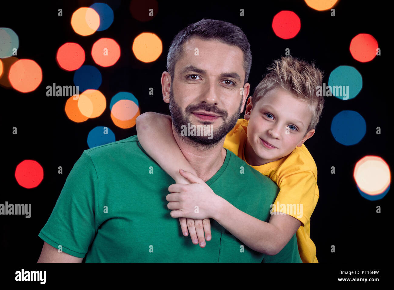 Smiling father and son Stock Photo - Alamy