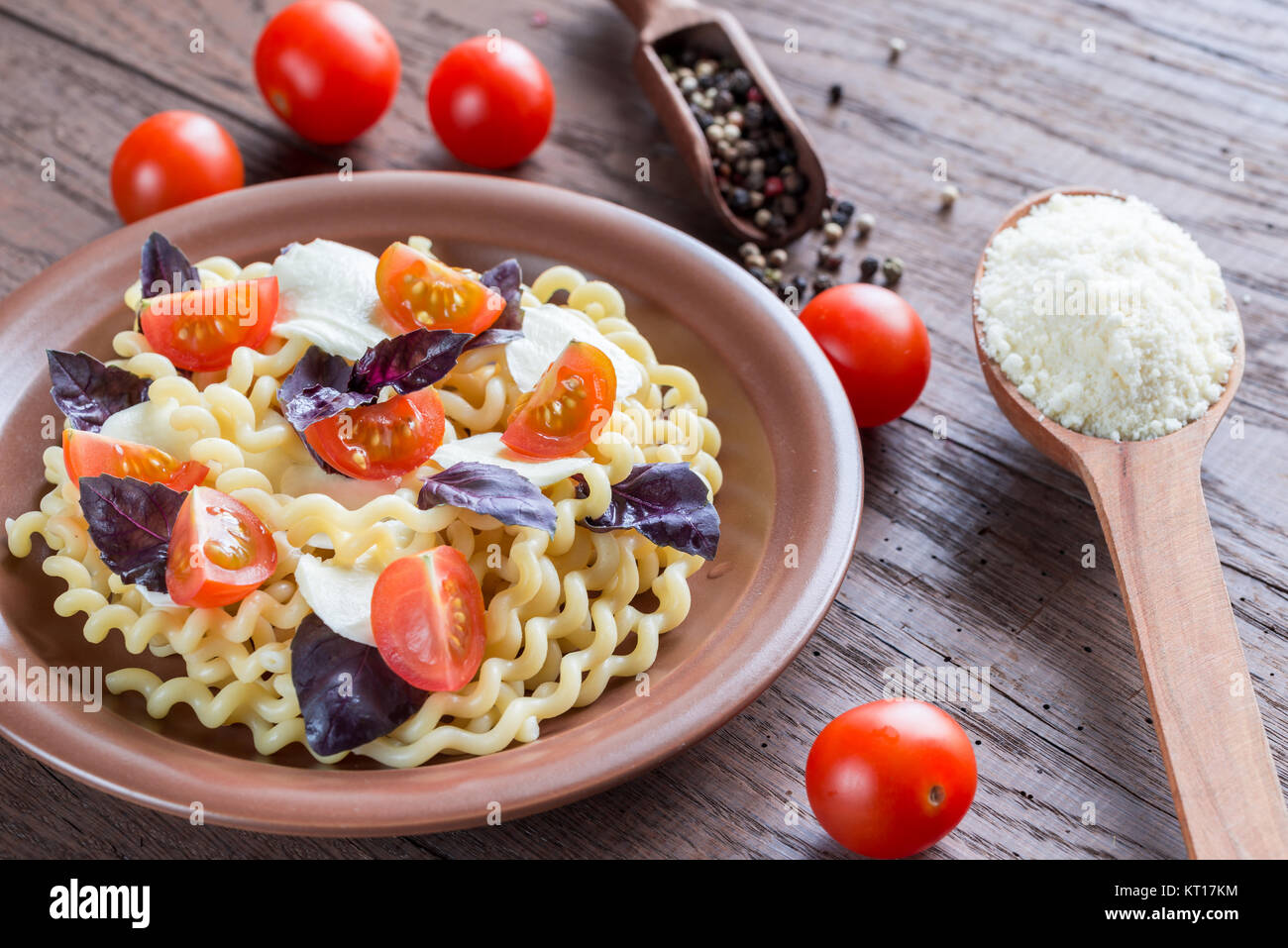 Fusilli lunghi with cheese and cherry tomatoes Stock Photo Alamy