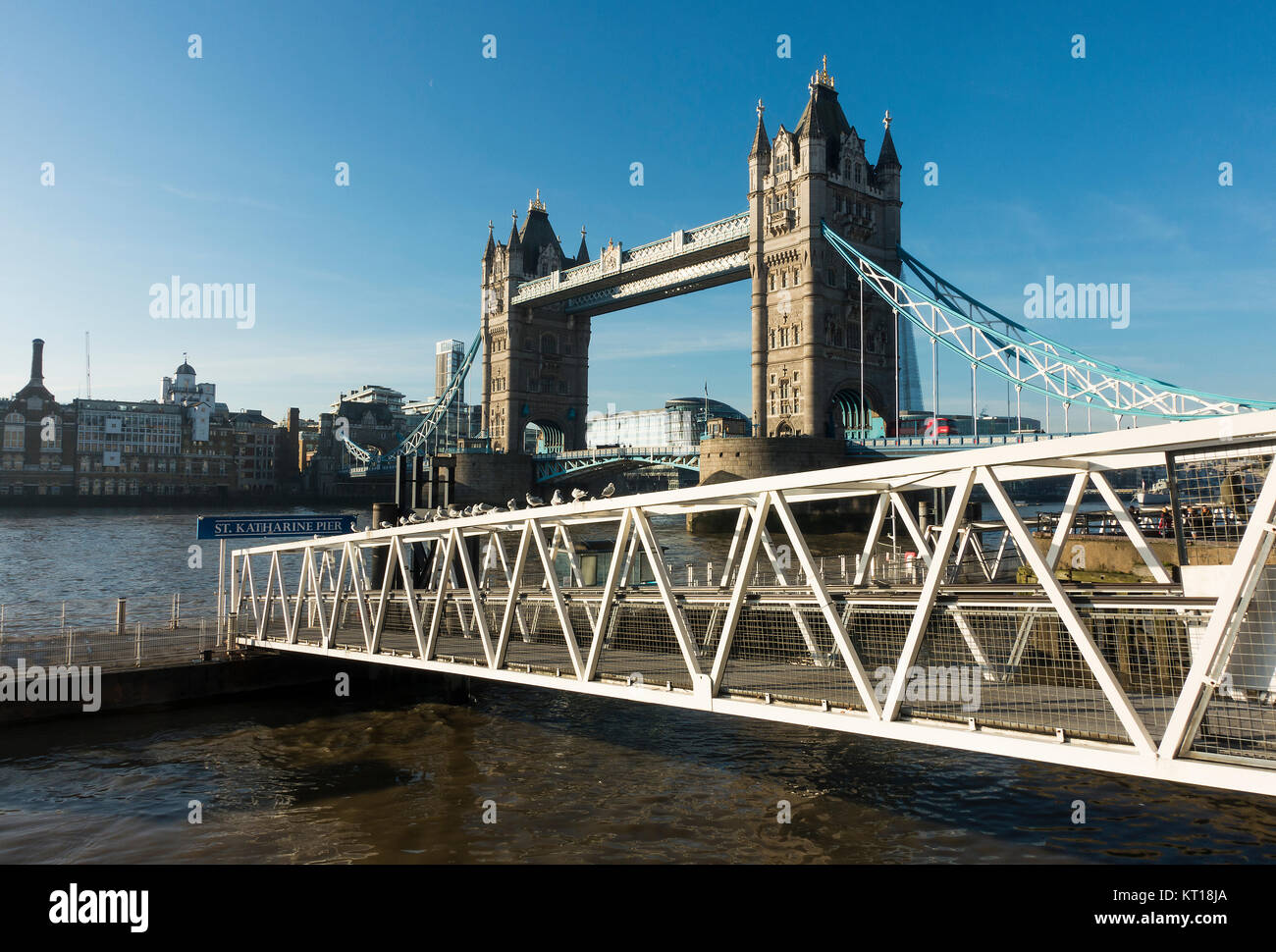 Tower Bridge and River Thames with St Katharine Pier on a Clear Winter Day with Beautiful Blue Sky London England United Kingdom UK Stock Photo